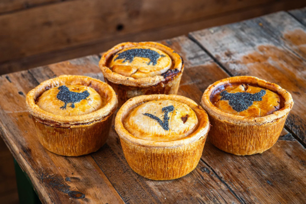 assorted handmade pies wooden chopping board horiz 600x400 - Those amazing pies are back from Bristol Pie Society